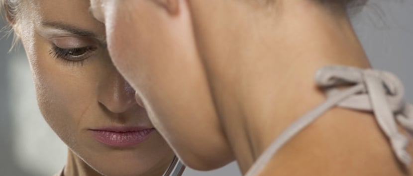 a close-up of a woman and a man