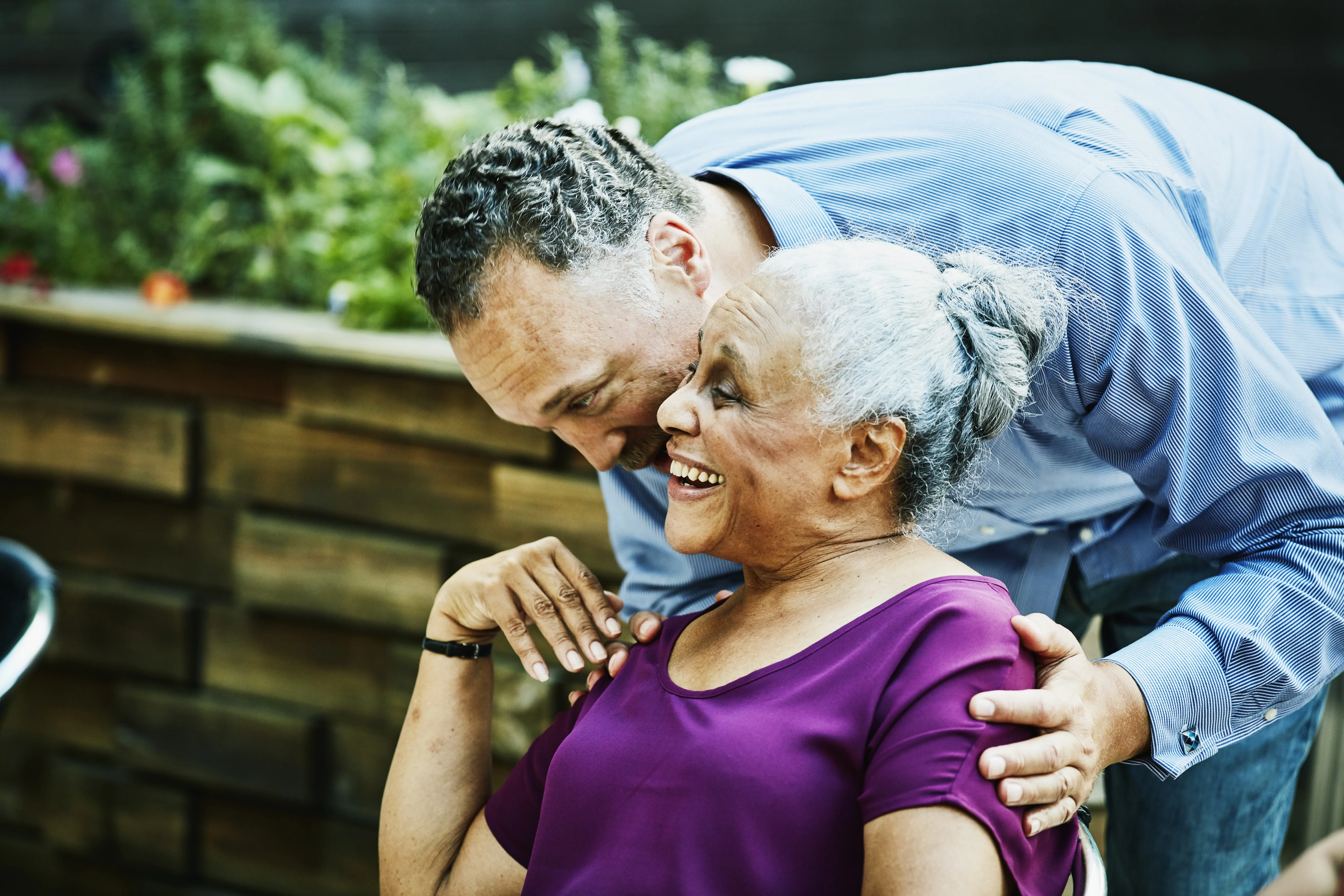 a man hugging a woman