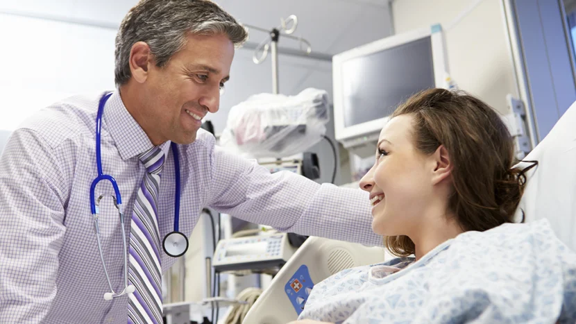 a doctor talking to a patient